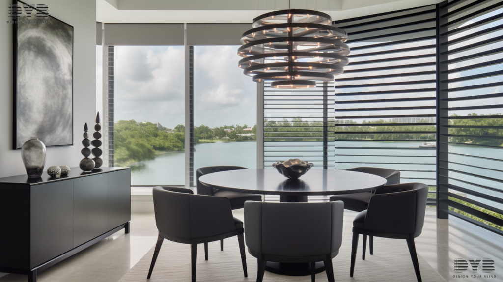 A chic, Urban Modern dining room in Parkland, FL with Pirouette Shades on a large window overlooking a serene lake. The shades are partially open, allowing for a soft, diffused light to filter into the space. The table is from Baker Furniture, a beautiful dark wood with sleek, modern chairs that blend seamlessly with the room's sophisticated aesthetic. There is a glass sculpture on a side table, adding a touch of elegance and style to the room. The window treatment is the focal point, emphasizing the elegance and practicality of Pirouette Shades.