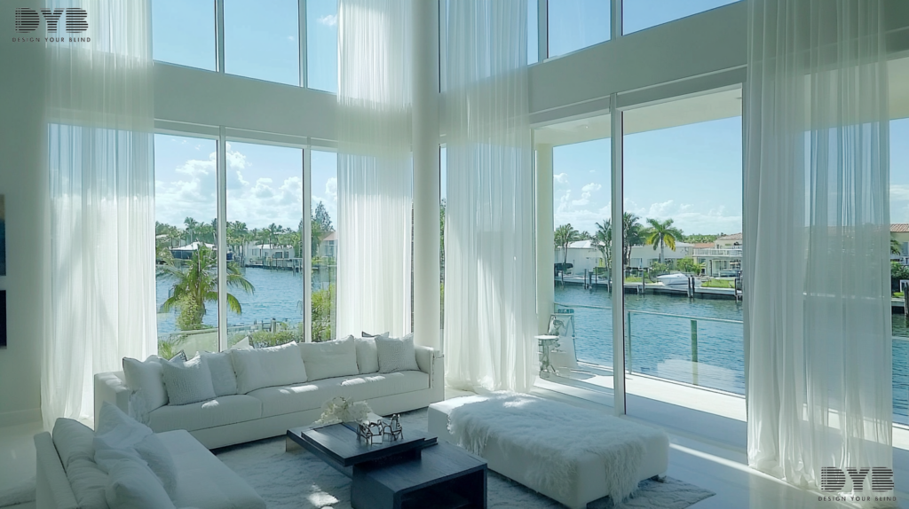 Sheer curtains in a coastal living room in Lighthouse Point, FL, with a view of the Intercoastal Waterway