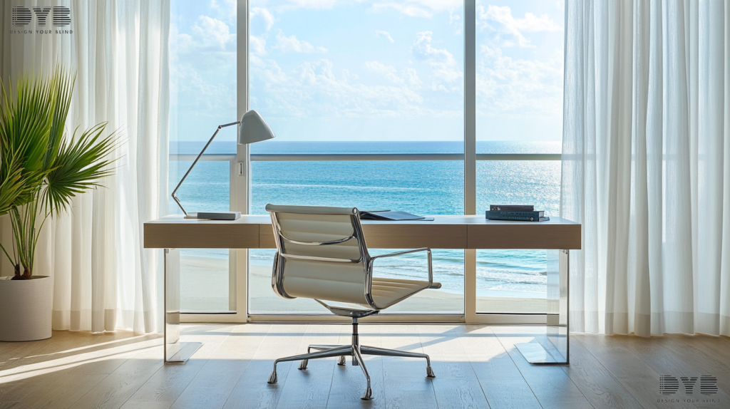 A home office in West Palm Beach, Florida with sheer curtains, a sleek desk, and an ocean view.