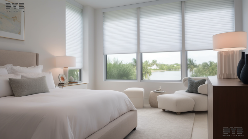 A Master Bedroom in West Palm Beach, FL, styled in a Transitional design with a view of Canals. The room features a sleek, white bed with plush bedding and a contemporary sculpture on the nightstand. The windows are large and feature fully closed Roller Shades. Shot type: underexposed