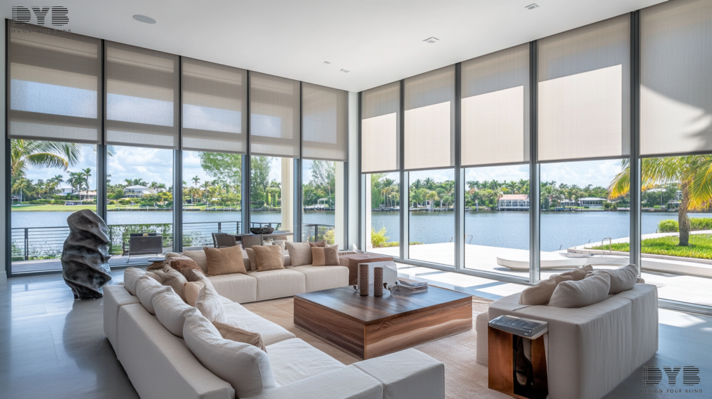 A living room with a large sofa, large windows with blackout roller shades, and a contemporary sculpture.